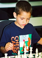 Child playing chess.