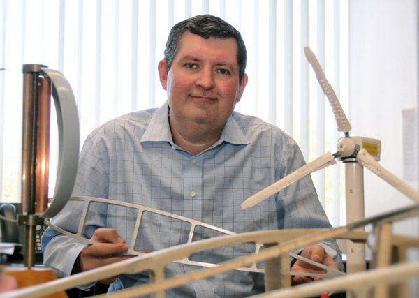 Todd Griffith with wind turbine models