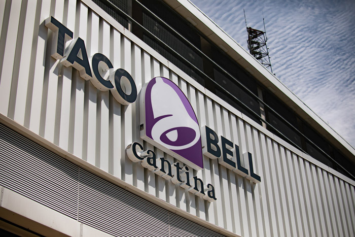 Taco Bell Cantina sign on the side of a building. 