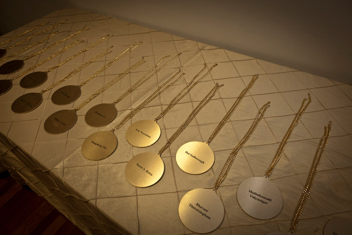 Medals displayed on a table. 