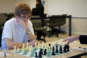 Expert chess player at weekend exhibition